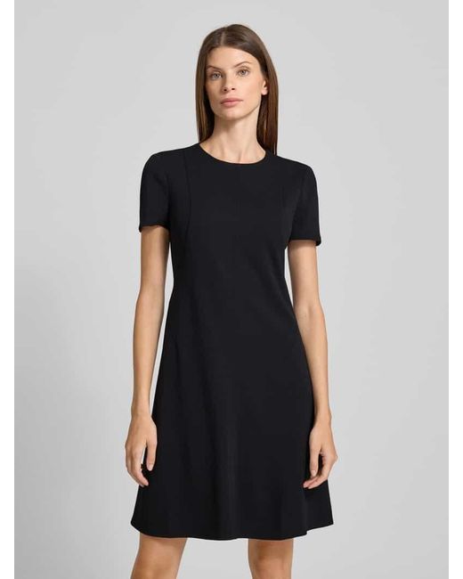 Calvin Klein Black Scuba Fit T-Shirt-Kleid mit Nahtreißverschluss Modell 'Flare'