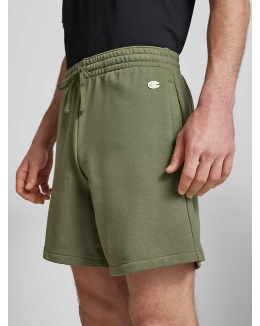 Champion Relaxed Fit Sweatshorts mit Logo-Badge Modell 'Sustainable' in Green für Herren