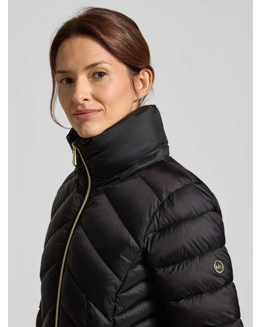 MICHAEL Michael Kors Gewatteerde Lange Jas Met Opstaande Kraag, Model 'Longline' in het Black