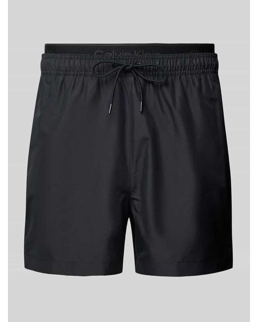 Calvin Klein Relaxed Fit Badeshorts im Double-Layer-Look in Black für Herren