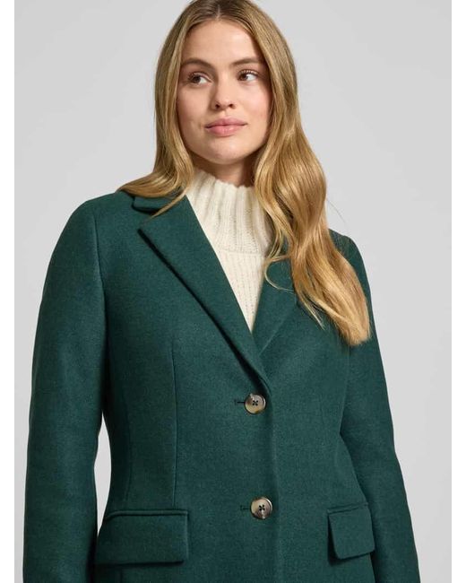 christian berg Green Mantel mit Reverskragen und Pattentaschen