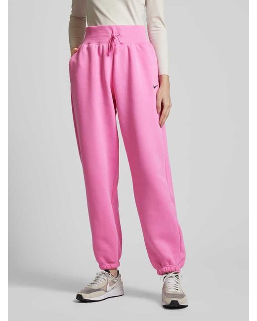 Nike Pink Loose Fit Sweatpants mit Logo-Stitching