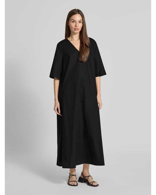 Christian Berg Women Black Tunikakleid mit V-Ausschnitt und Eingrifftaschen