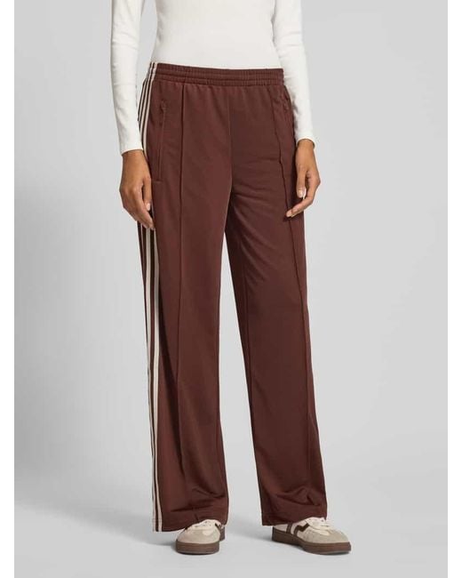 Adidas Originals Brown Flared Sweatpants mit Label-Stitching Modell 'FIREBIRD'
