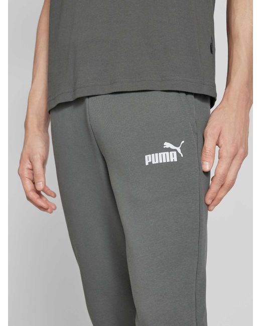 PUMA Regular Fit Sweatpants mit Label-Print in Green für Herren