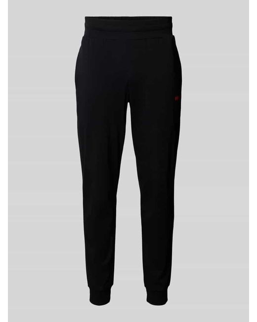 HUGO Loose Fit Sweatpants mit Label-Print Modell 'Linked' in Black für Herren