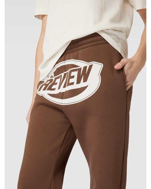 Review Brown Sweatpants mit Puff Logo-Print