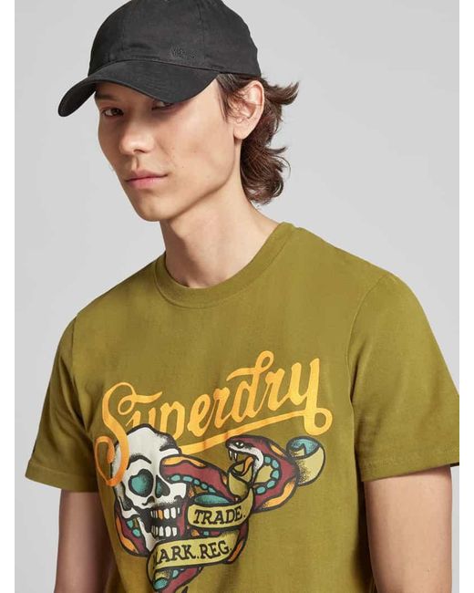 Superdry T-Shirt mit Motiv- und Statement-Print Modell 'TATTOO SCRIPT' in Green für Herren