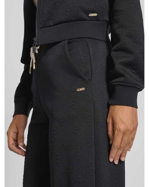 Guess Black Wide Leg Stoffhose mit Strukturmuster Modell 'PEONY'