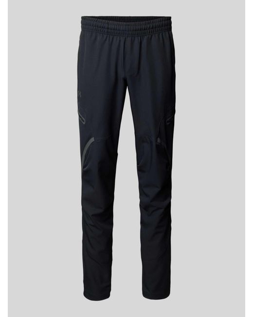 Under Armour Relaxed Fit Trainingsbroek Met Cargozakken, Model 'Unstoppable' in het Blue voor heren