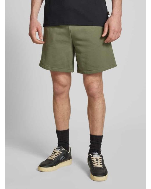 Champion Relaxed Fit Sweatshorts mit Logo-Badge Modell 'Sustainable' in Green für Herren