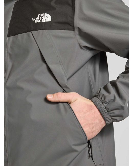 The North Face Windbreaker Met Labelprint in het Gray voor heren