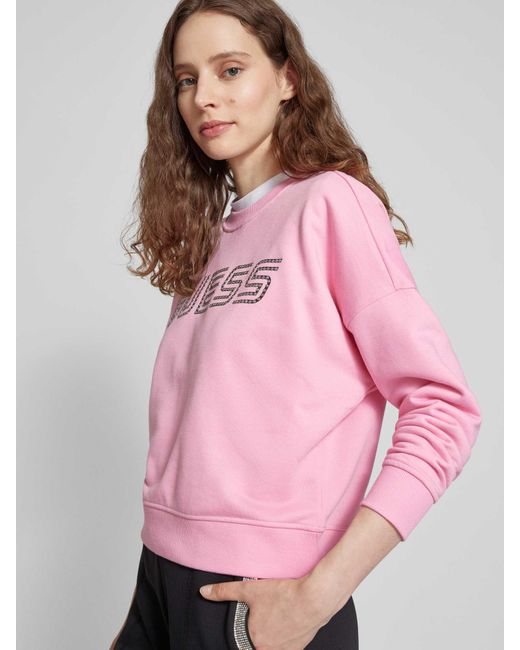 Guess Pink Sweatshirt mit überschnittenen Schultern und Label-Print