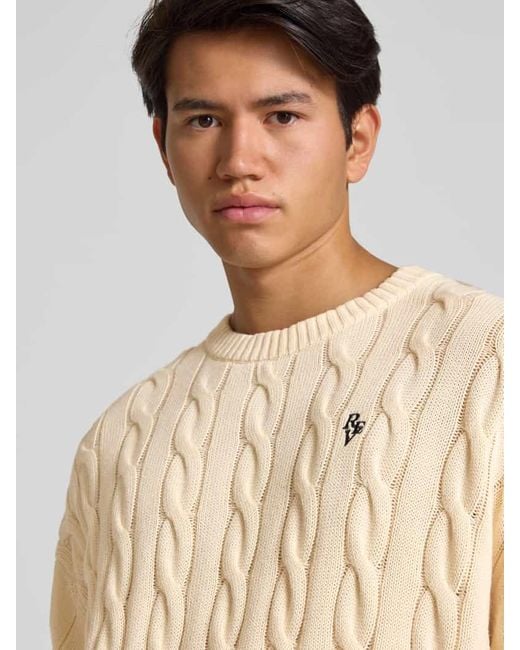Review Strickpullover mit Zopfmuster und Label-Stitching in Natural für Herren