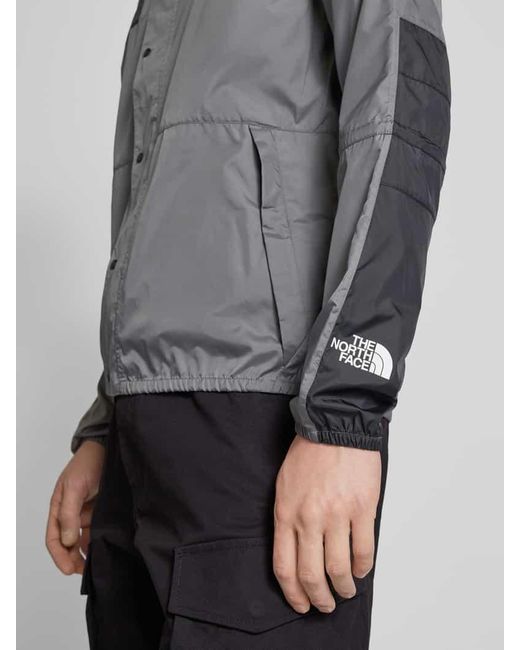 The North Face Jacke mit Label-Print Modell 'SEASONAL MOUNTAIN' in Gray für Herren