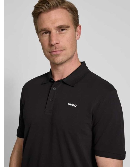 HUGO Poloshirt mit Label-Print Modell 'Donos' in Black für Herren