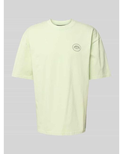 PEGADOR Oversized T-Shirt mit Label-Print Modell 'BUCKLIN' in Yellow für Herren