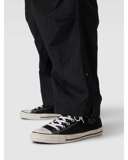 Urban Classics Parachute Pants mit Beinabschlüssen mit Tunnelzug in Black für Herren