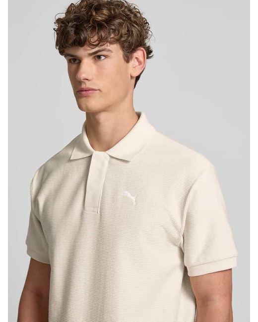 PUMA Relaxed Fit Poloshirt mit Label-Stitching in Natural für Herren