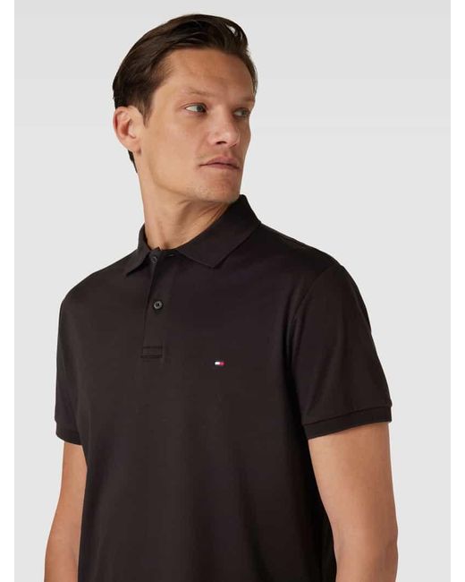 Tommy Hilfiger Regular Fit Poloshirt mit Label-Stitching in Black für Herren