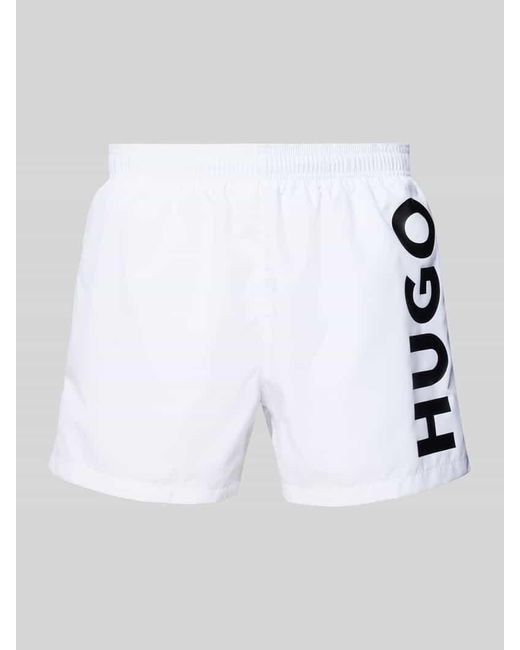 HUGO Relaxed Fit Badeshorts mit Label-Print Modell 'ABAS' in White für Herren