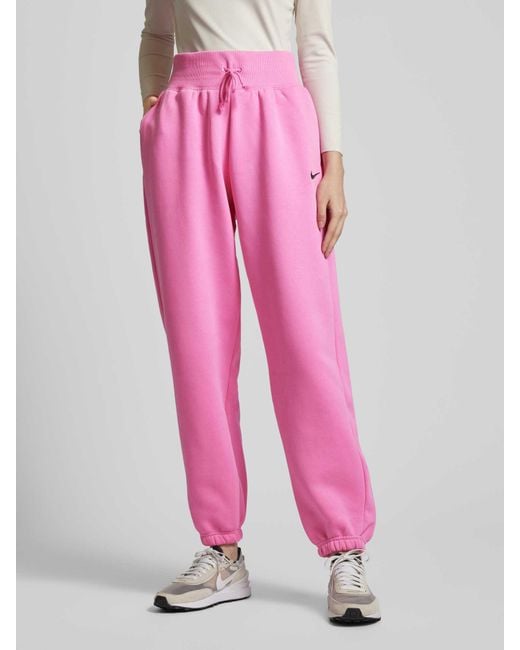 Nike Pink Loose Fit Sweatpants mit Logo-Stitching