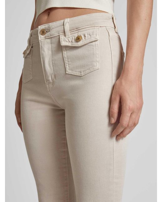 Guess Natural Flared Jeans mit aufgesetzten Pattentaschen Modell 'SEXY FLARE'