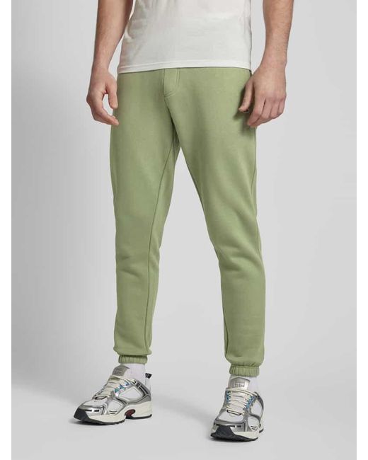 Tommy Hilfiger Slim Fit Sweatpants mit angedeutetem Eingriff in Green für Herren