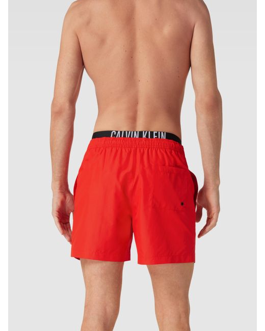 Calvin Klein Zwembroek Met Labeldetails in het Rood voor heren | Lyst NL