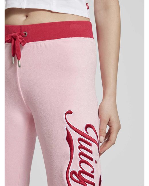 Juicy Couture Flared Cut Sweatpants Met Labelstitching in het Pink