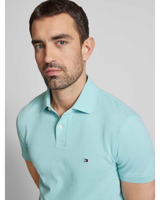 Tommy Hilfiger Regular Fit Poloshirt aus Baumwoll-Mix in Blue für Herren