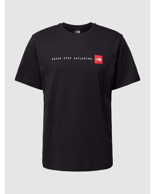 The North Face T-Shirt mit Label-Print Modell 'NEVER STOP EXPLORIN' in Black für Herren