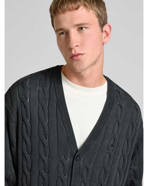 Carhartt Strickjacke mit Zopfmuster und V-Ausschnitt in Black für Herren
