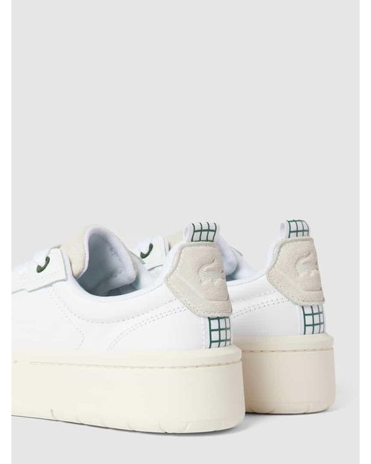 Lacoste Plateau-Sneaker mit Label-Details Modell 'CARNABY' in White für Herren