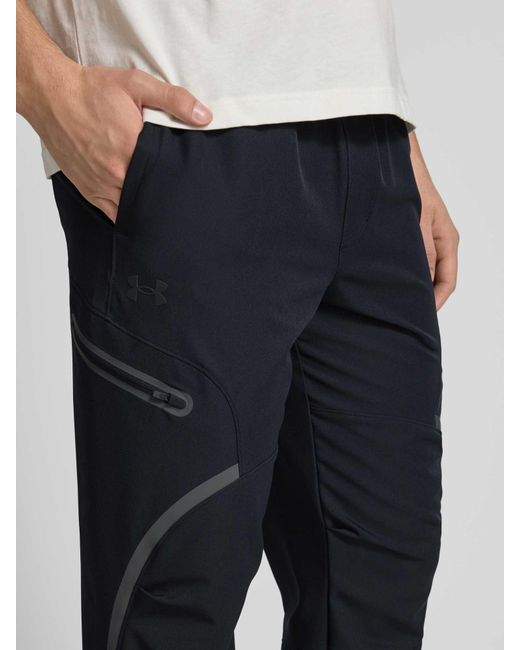 Under Armour Relaxed Fit Trainingsbroek Met Cargozakken, Model 'Unstoppable' in het Blue voor heren