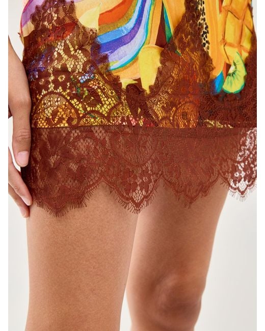 Never Fully Dressed Orange Rio Maeva Mini Skirt