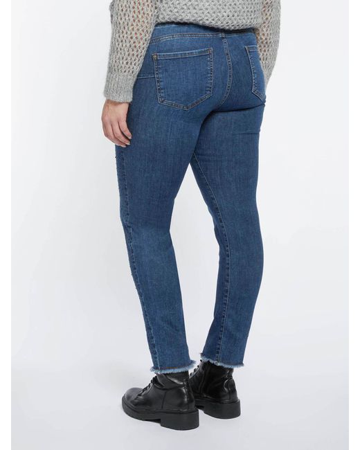 Jeans skinny con applicazioni di FIORELLA RUBINO in Blue