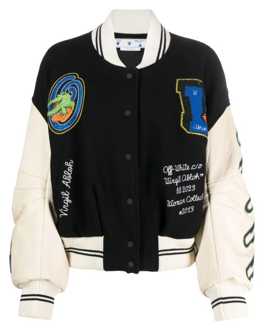 all white with black blazer