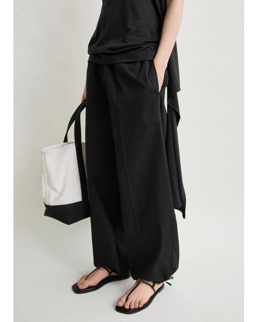 Totême Drawstring Cotton Trousers Black