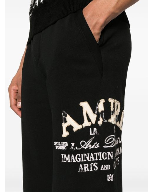 Amiri Black Logo-embroidered Wide-leg Track Pants for men