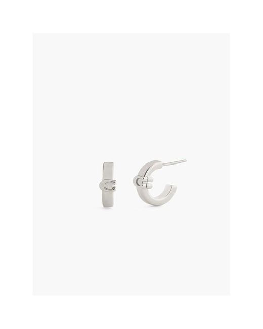 COACH White Huggie Earrings