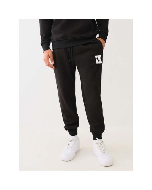 True Religion Black Studded Registered Icon Jogging Bottoms for men