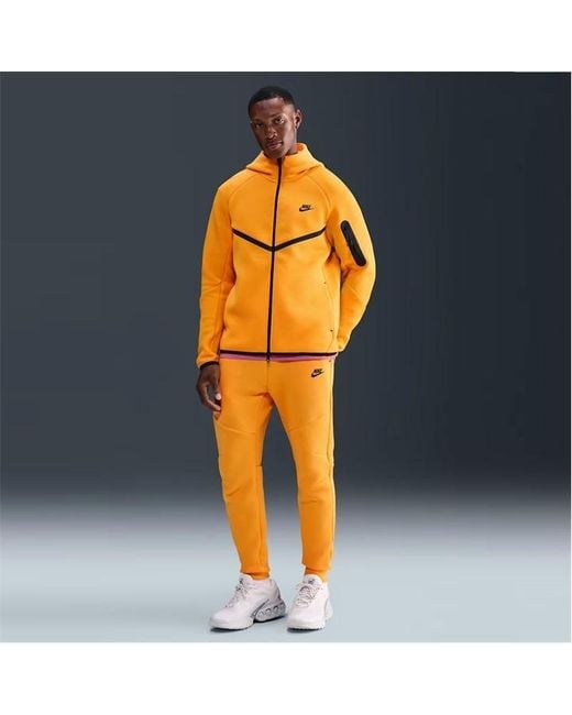 Nike Orange Tch Flc Jgr Sn54 for men