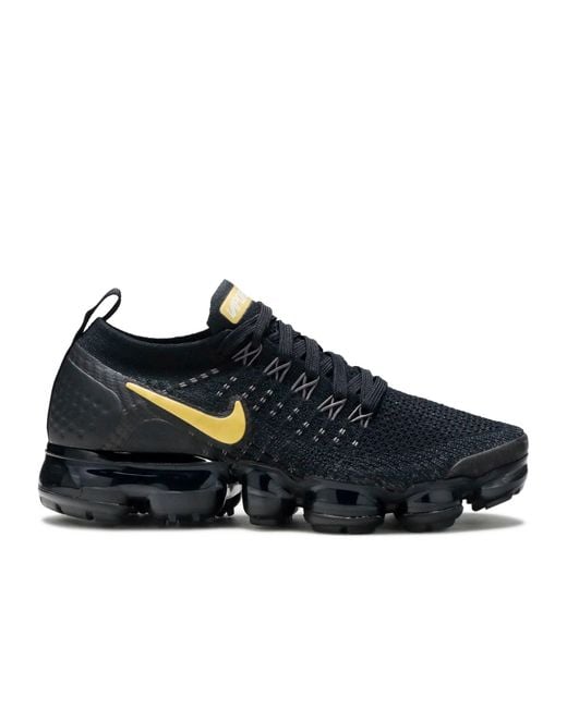 black and gold vapormax