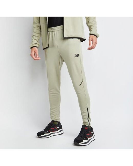 Tenacity Pantalones New Balance de hombre de color Natural