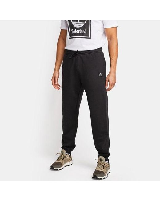 Woven Badge Pantalons Timberland pour homme en coloris Black