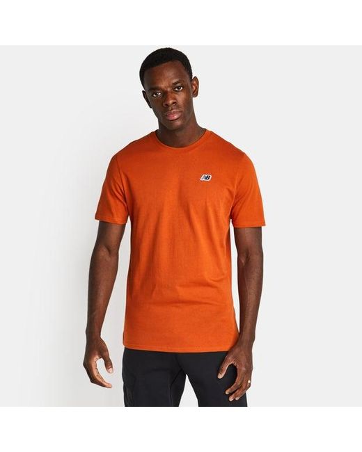 New Balance Orange Small Logo T-shirts for men