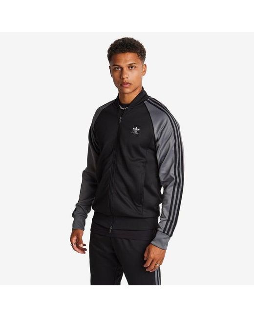 Black adidas superstar jacket sales