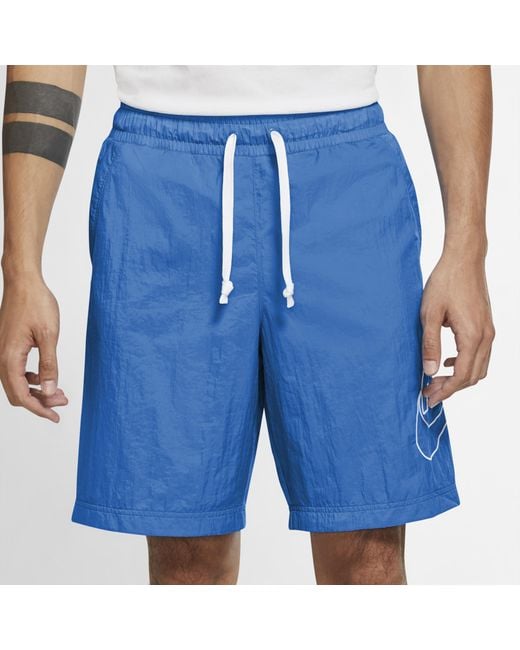 blue nike woven shorts