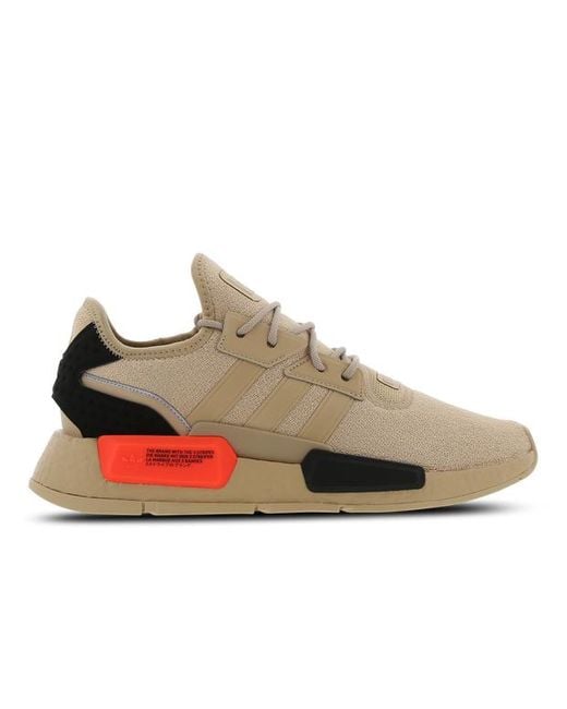 Pink nmd best sale men